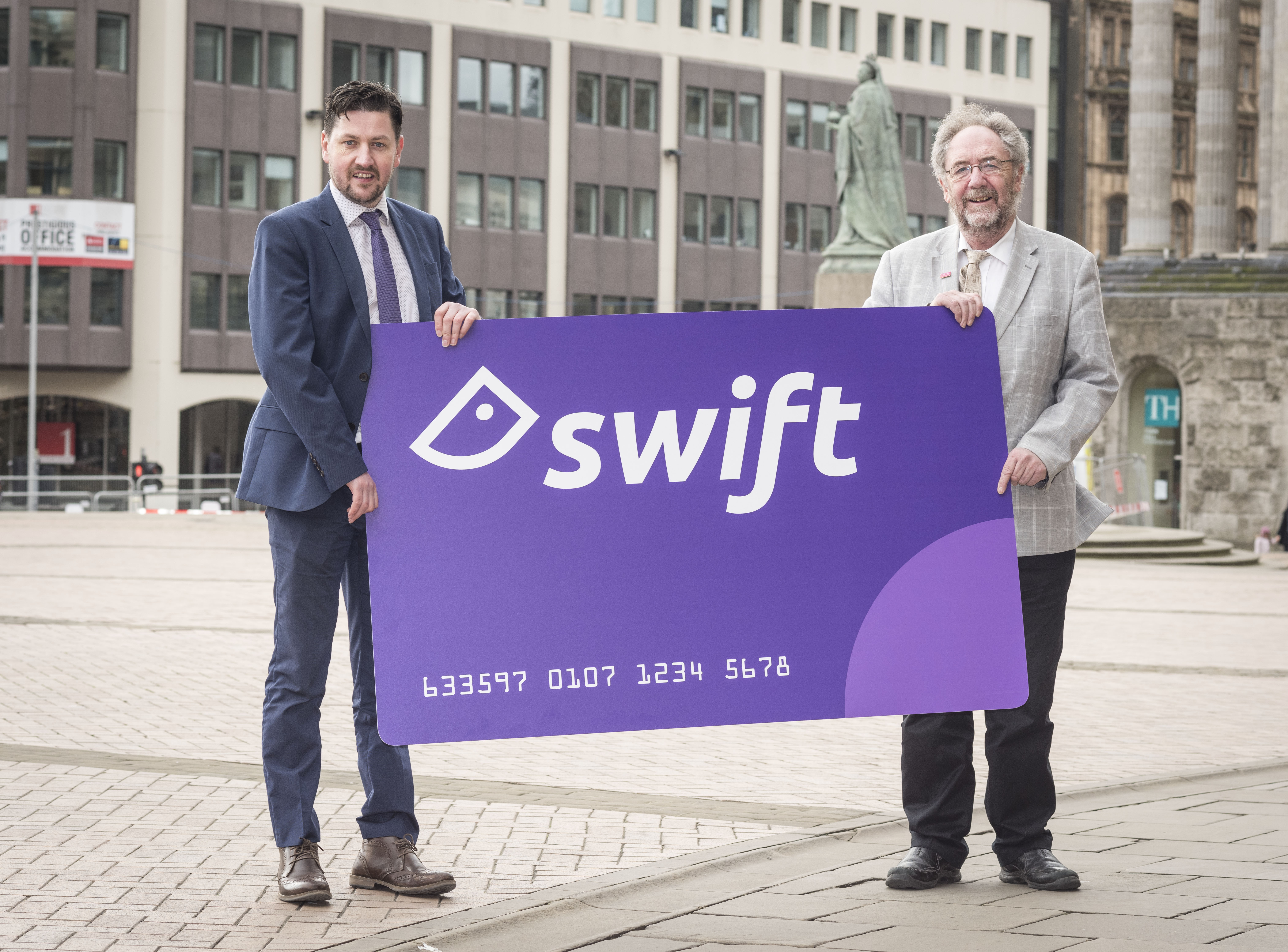 Travelling smart: Matt Lewis (left), head of Swift for TfWM, and Cllr Roger Lawrence, WMCA lead for transport, with the new look Swift smartcard being issued to 9,000 more rail passengers