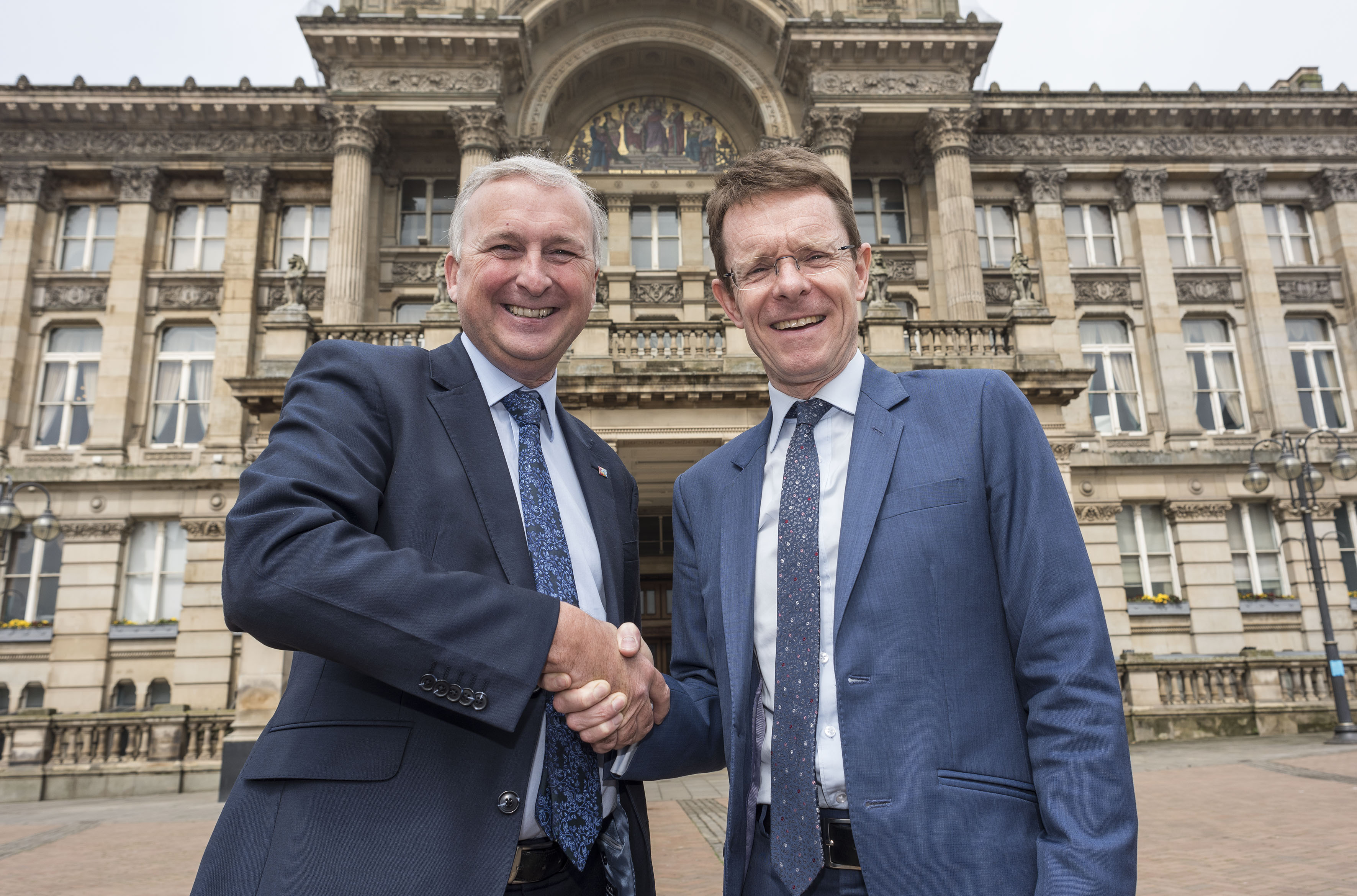 West Midlands Mayor Andy Street (right) offers Cllr Ian Ward, deputy leader of Birmingham City Council, the region’s formal backing for the city’s 2022 Commonwealth Games bid.