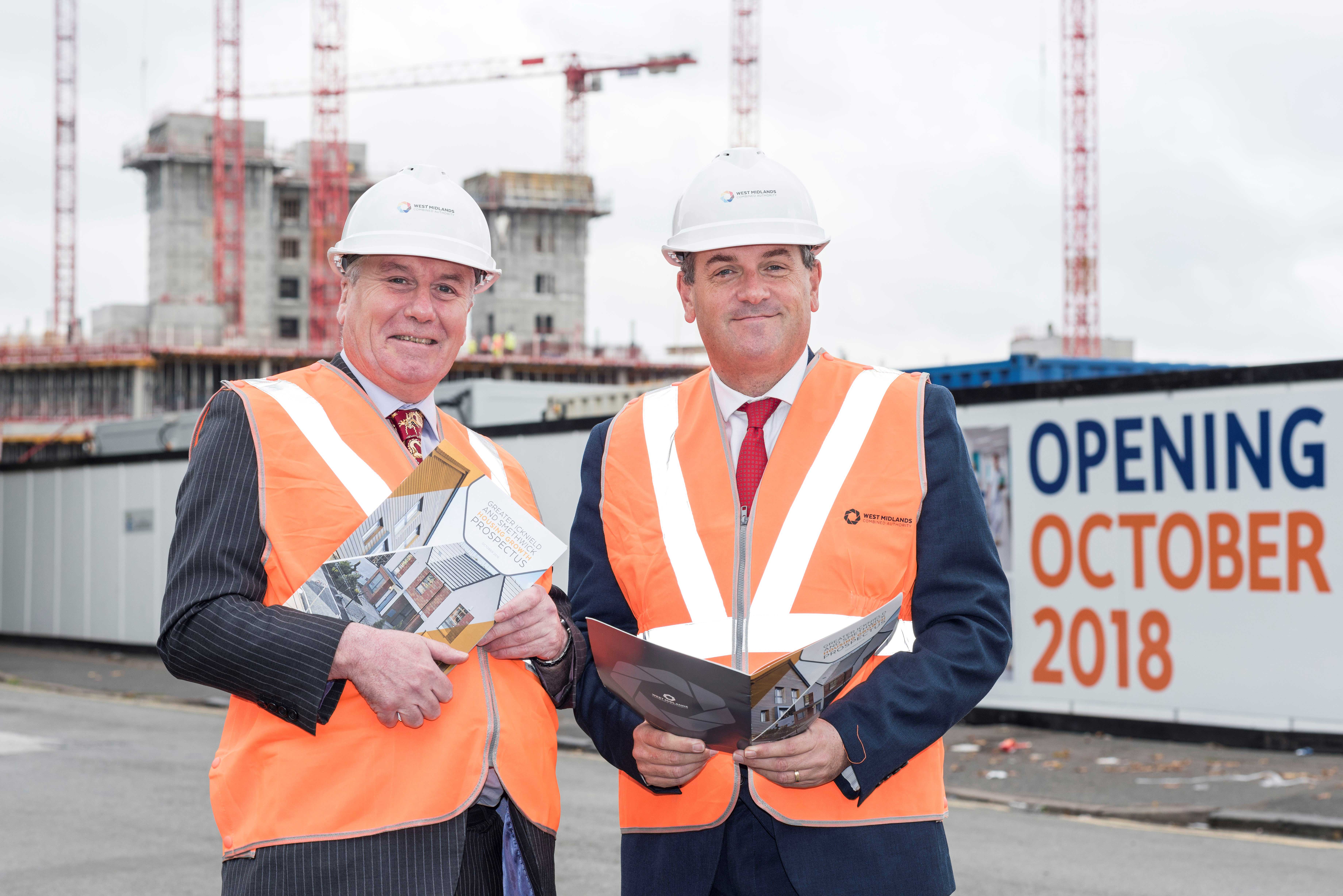 Cllr Steve Eling, left and Cllr John Clancy outside the new Midland Metropolitan Hospital, part of the Grove Lane housing scheme.