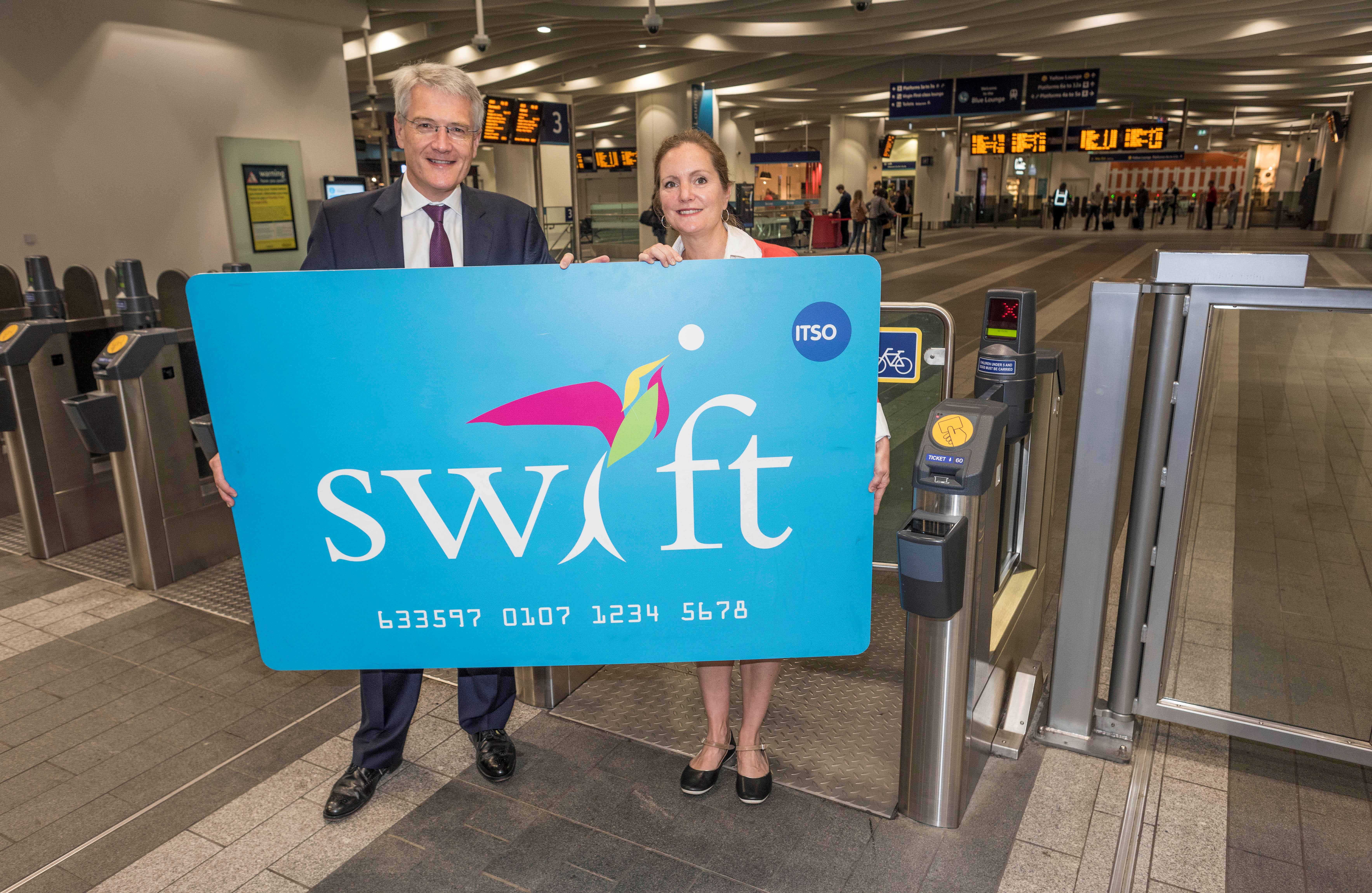 Transport minister Andrew Jones MP, left, launches Swift on rail with Laura Shoaf of Transport for West Midlands.