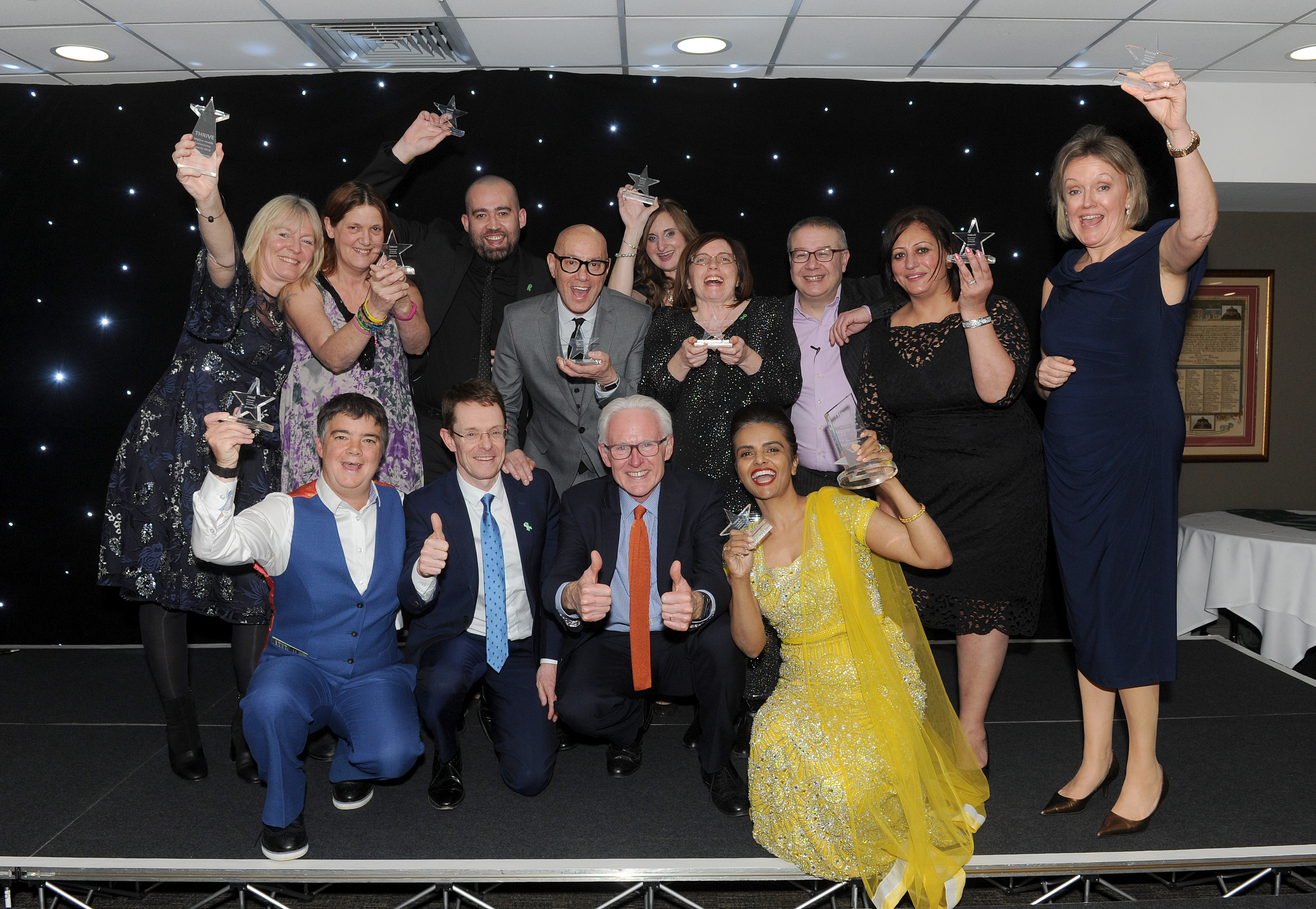 Last year's mental health stars celebrate along with event host Adrian Goldberg, Norman Lamb MP and West Midlands Mayor Andy Street.