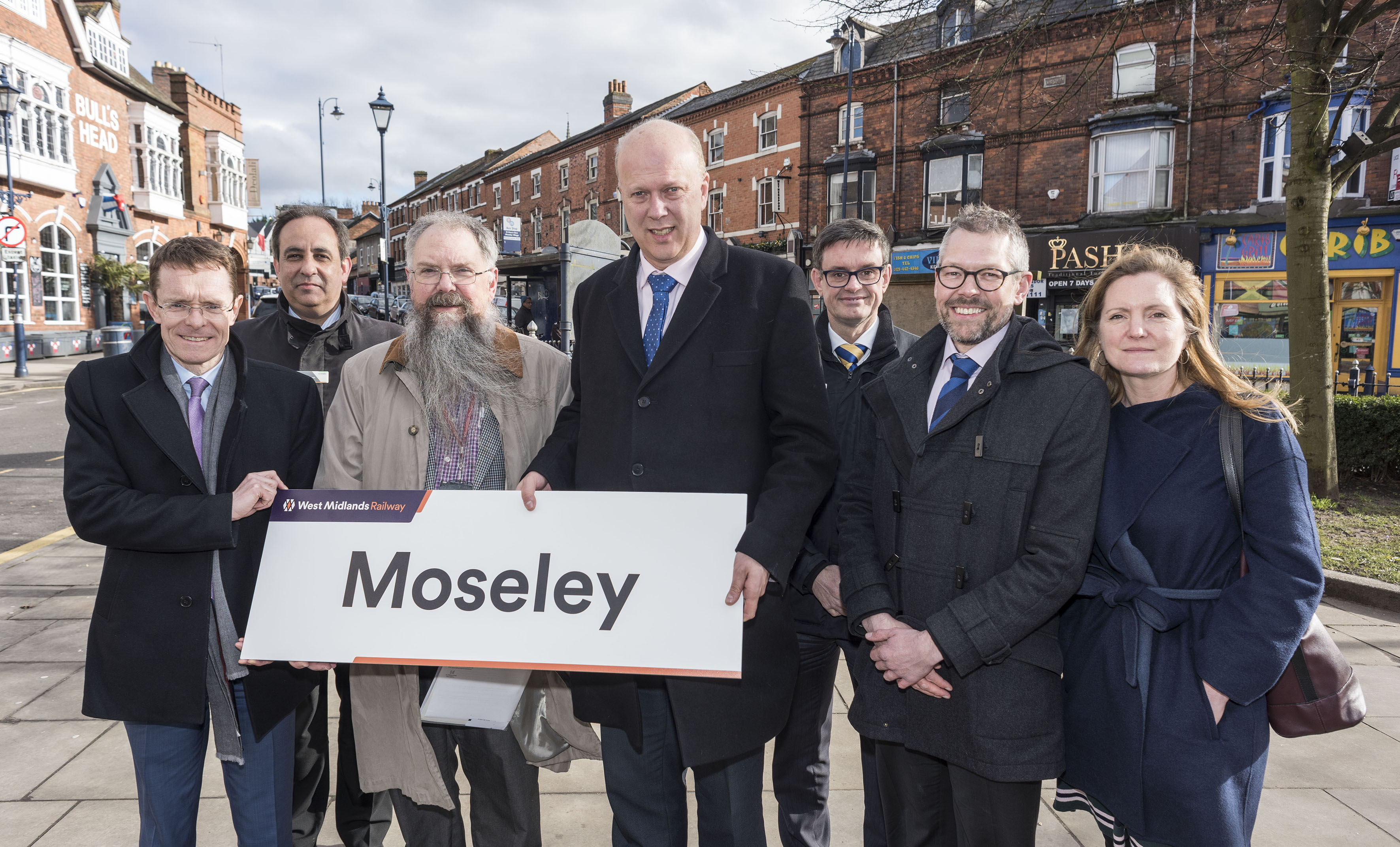 Mayor of the West Midlands Andy Street, left, Jan Chaudhry, managing director of West Midlands Railway, Cllr Stewart Stacey, Cabinet Member for Transport and Roads on Birmingham City Council, Chris Grayling MP, Martin Frobisher, Route Managing Director of Network Rail, Malcolm Holmes, TfWM Rail Director, and Laura Shoaf, managing director of TfWM, in Moseley.