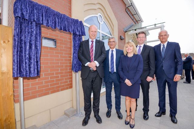Secretary of State for Transport, Chris Grayling MP, unveils a plaque at the official opening of Kenilworth Station