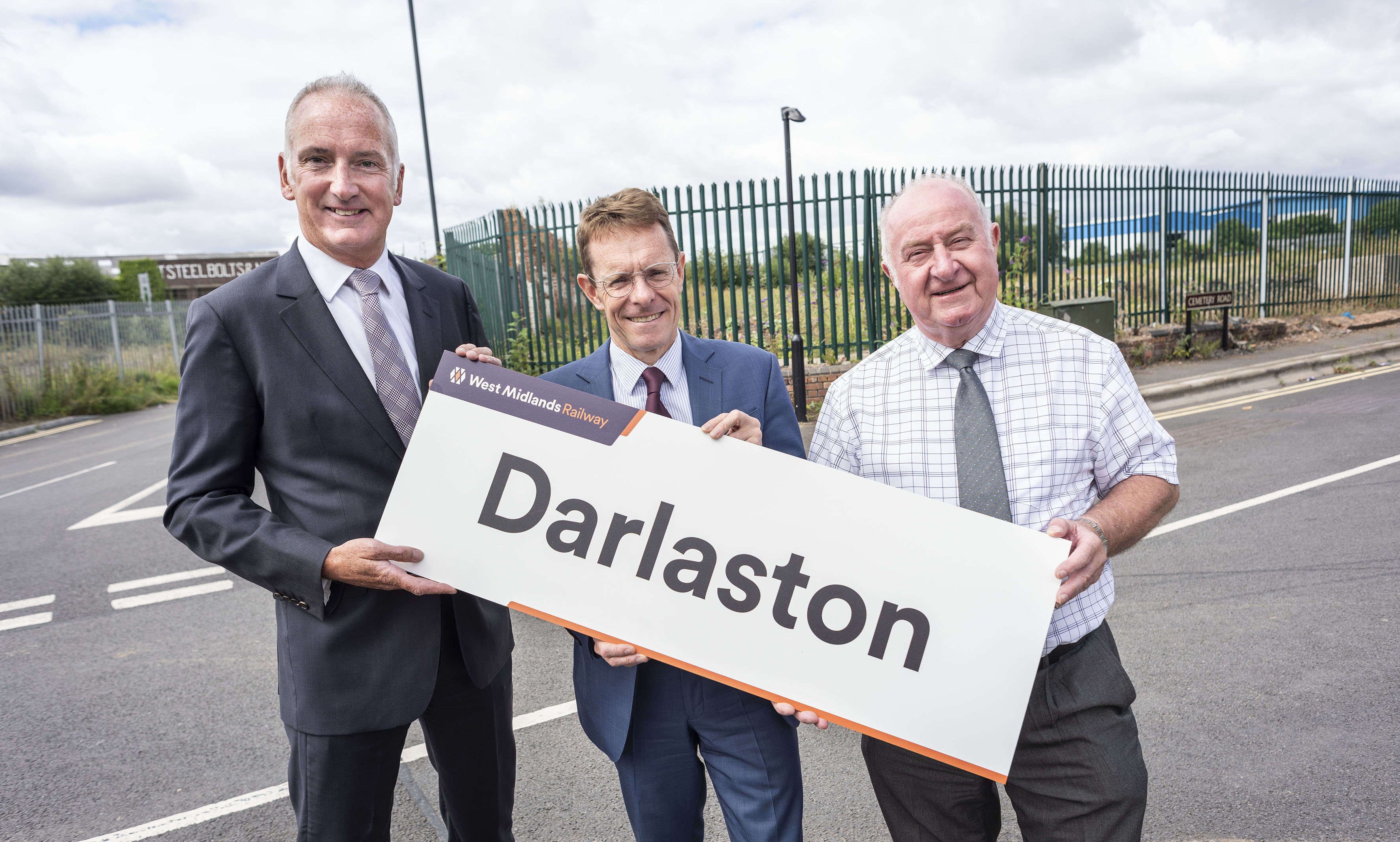 (l-r): Gareth Williams, development director of St Francis Group, Mayor of the West Midlands Andy Street and Cllr Mike Bird, leader of Walsall Council announce a land deal paving the way for a new train station at Darlaston