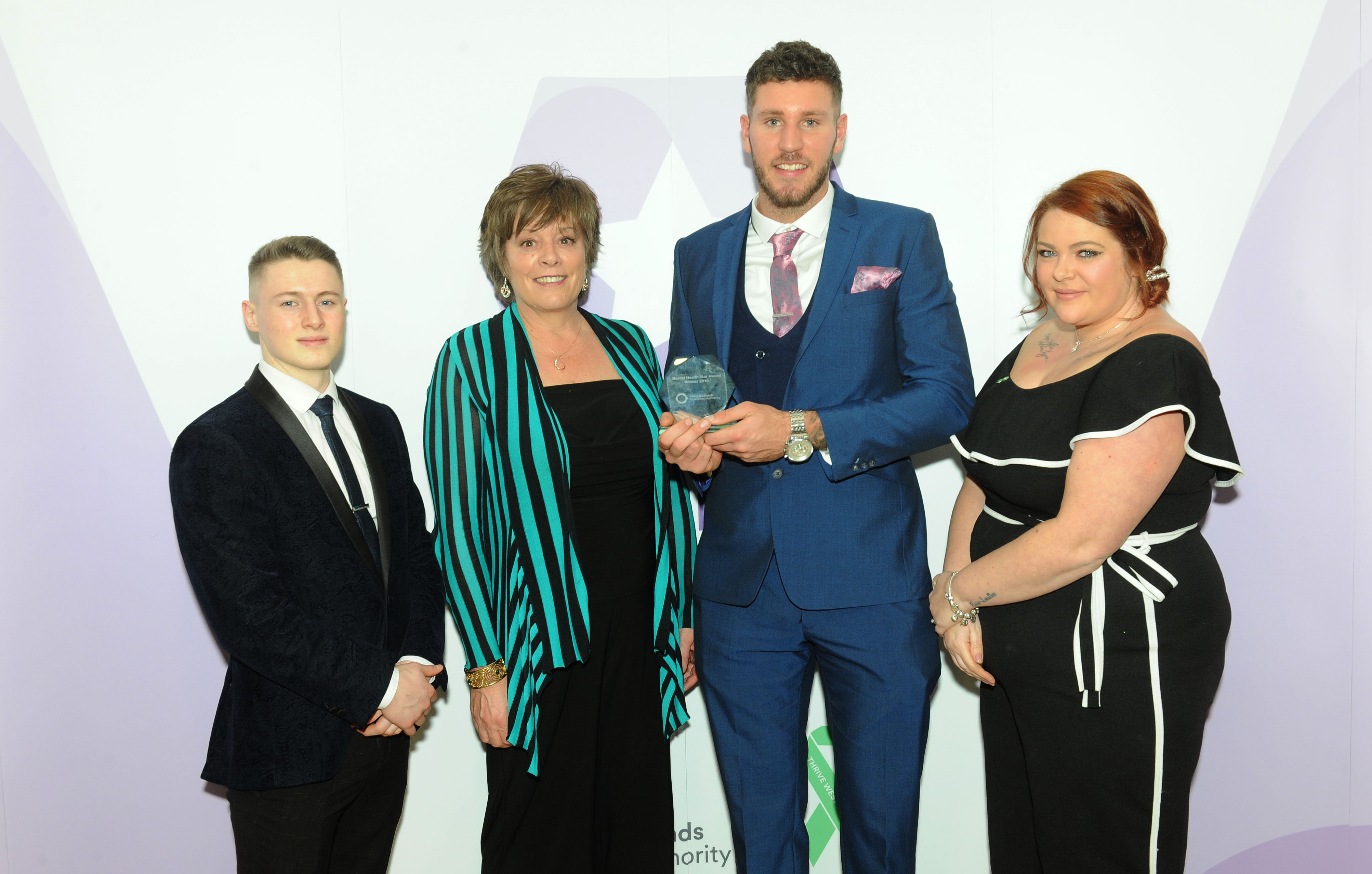 Joe Lockley and Bright Star Boxing Club colleagues celebrate winning a Thrive Mental Health Award.