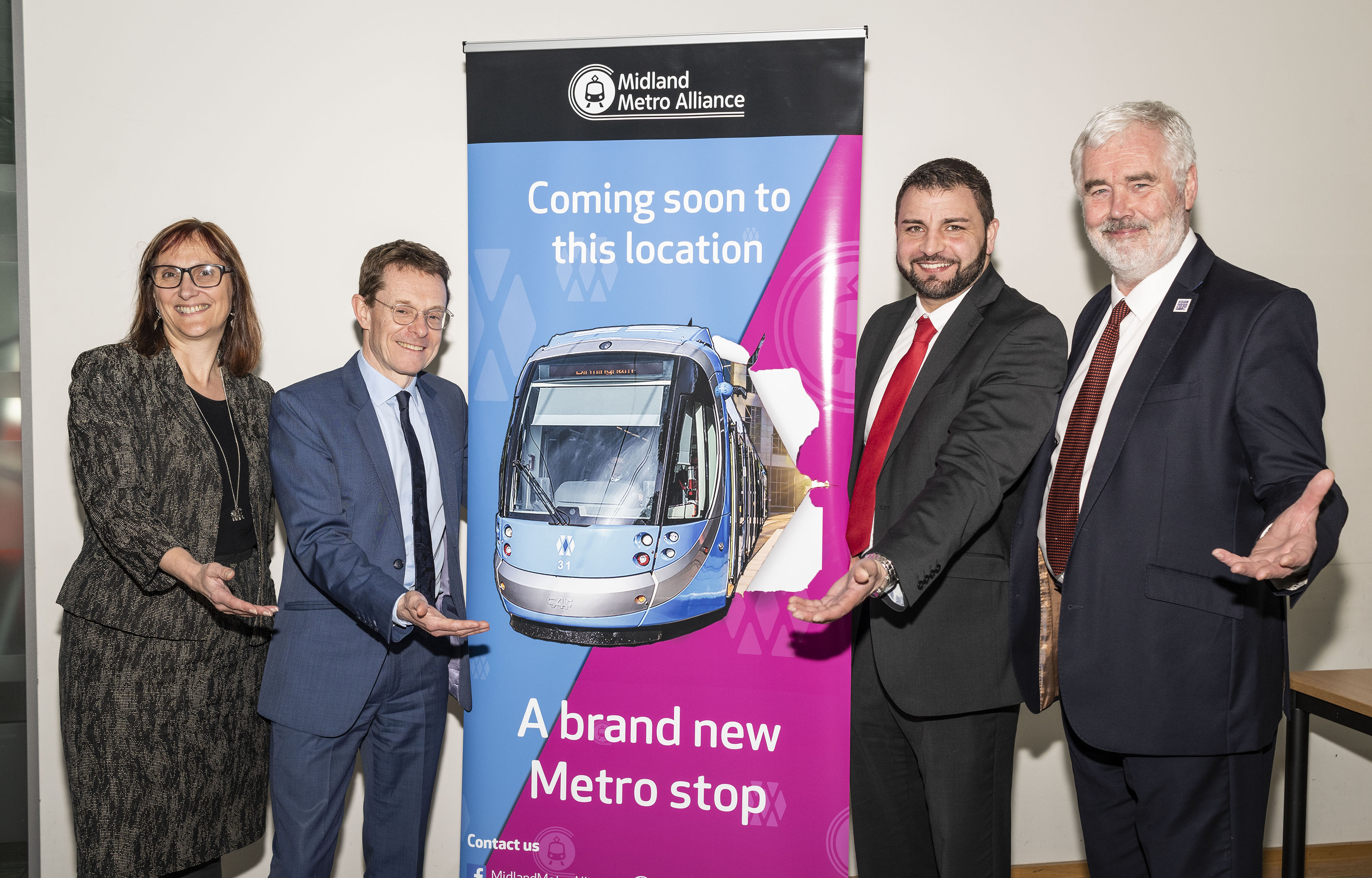 (from left to right) Sarah Norman, chief executive of Dudley Council, Mayor of the West Midlands Andy Street, Cllr Qadar Zada, leader of Dudley Council, and Cllr Steve Trow, leader of Sandwell Borough Council, celebrate the approval of funding for the Wednesbury to Brierley Hill Metro