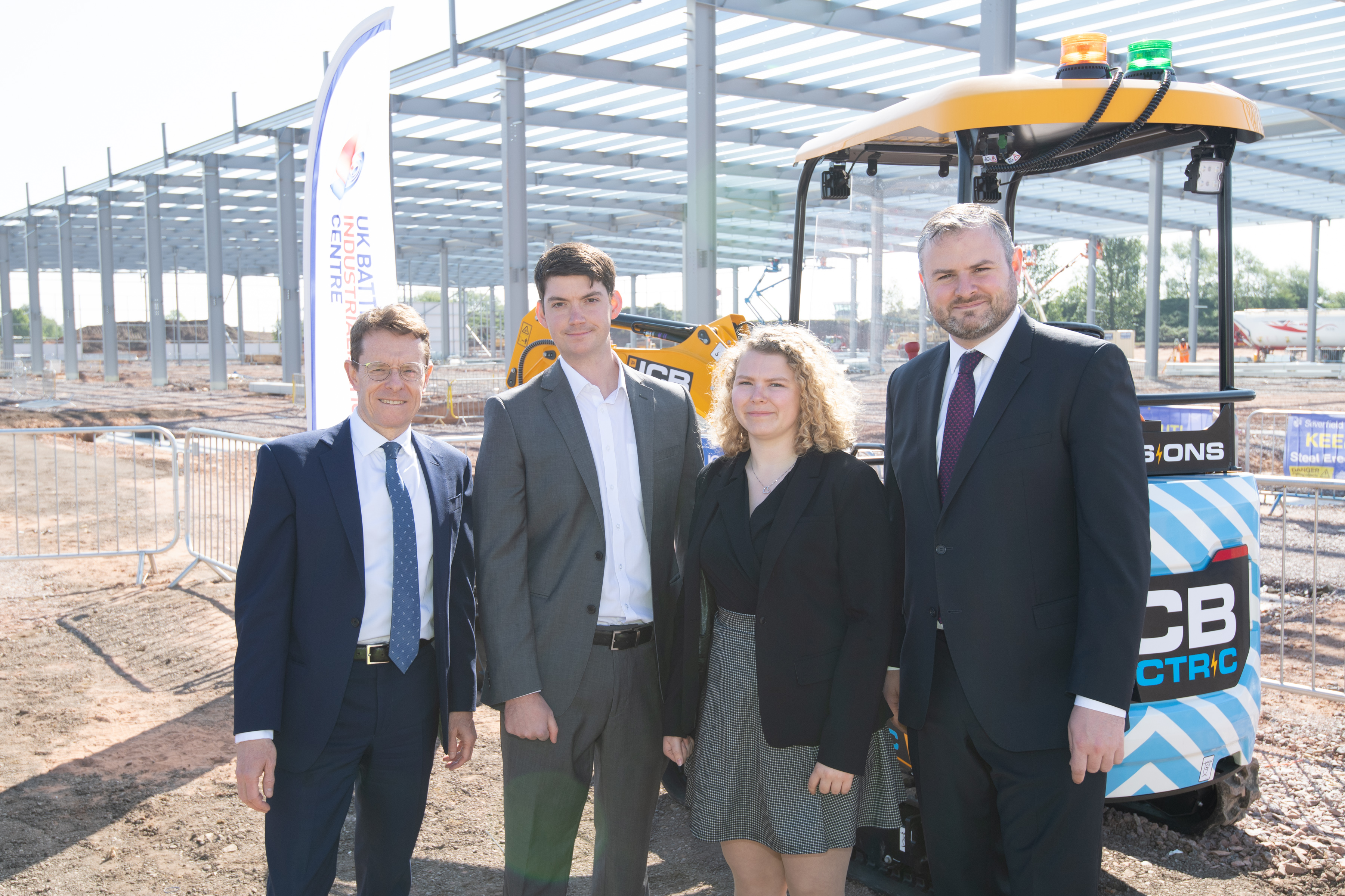 Mayor of the West Midlands Andy Street, George Hull lead engineer at UK Battery Industrialisation Centre, Eve Wheeler-Jones PhD student at WMG and Minister for Business and Industry Andrew Stephenson at the UK Battery Industrialisation Centre  under construction in Coventry