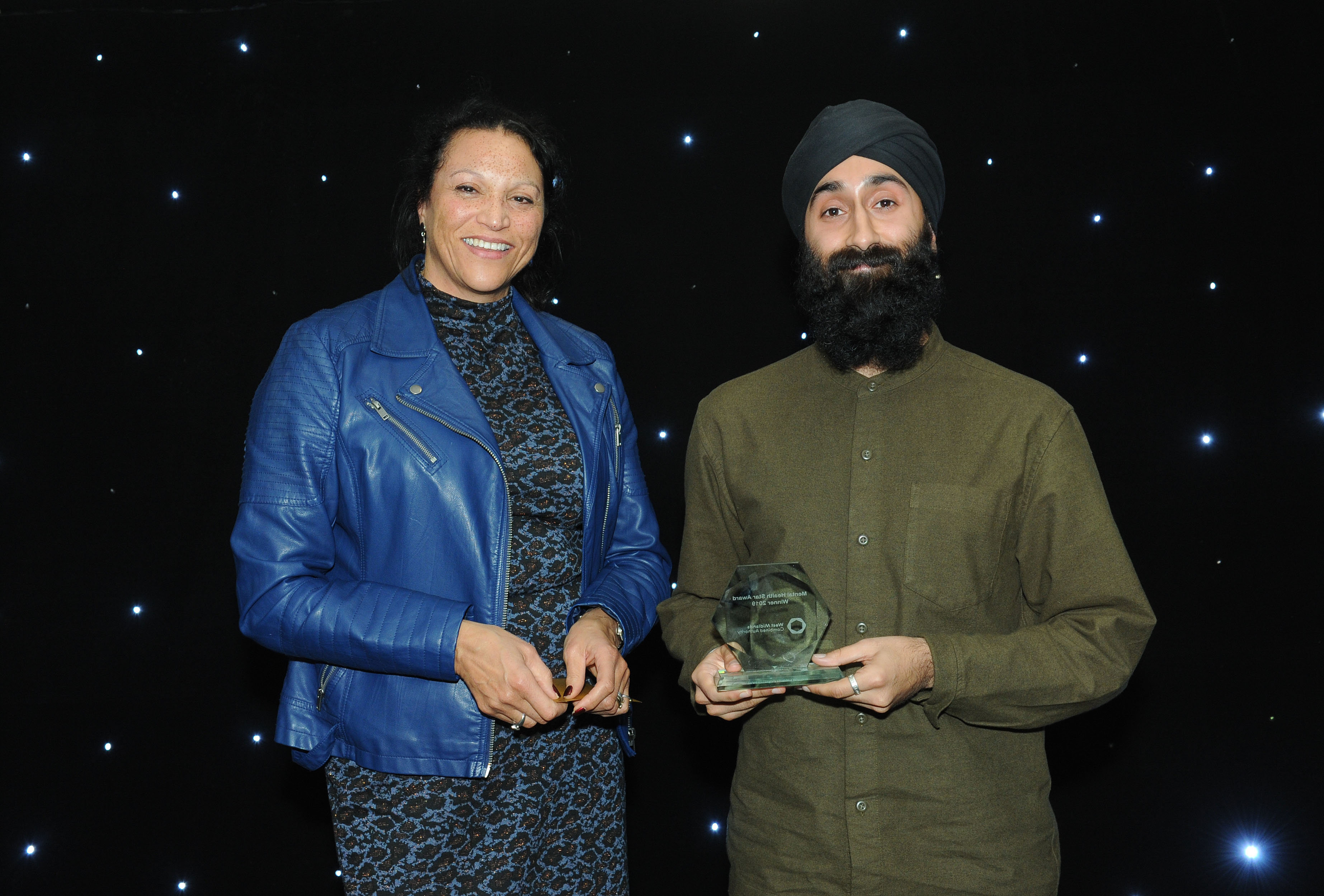 L-R Deborah Cadman, CEO of the WMCA, presents Shuranjeet Singh with his Thrive West Midlands Mental Health Star 2019 award