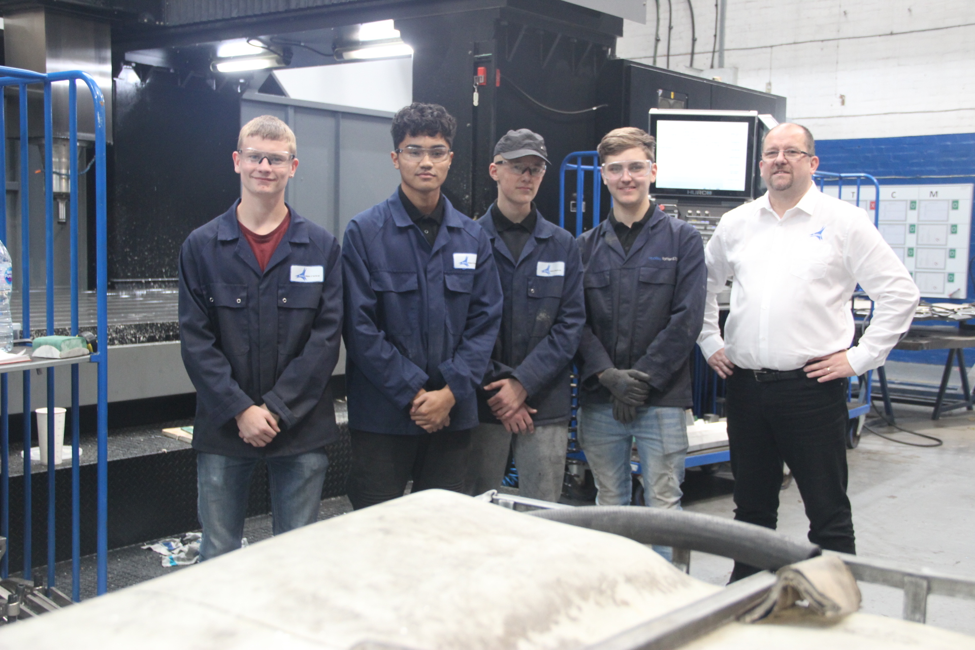 L-R Hockley Pattern and Tool Company apprentices Daniel Gill, Warayut Muensai, Tyler Kay and Derry Naylor, with production manager Alan de Grey
