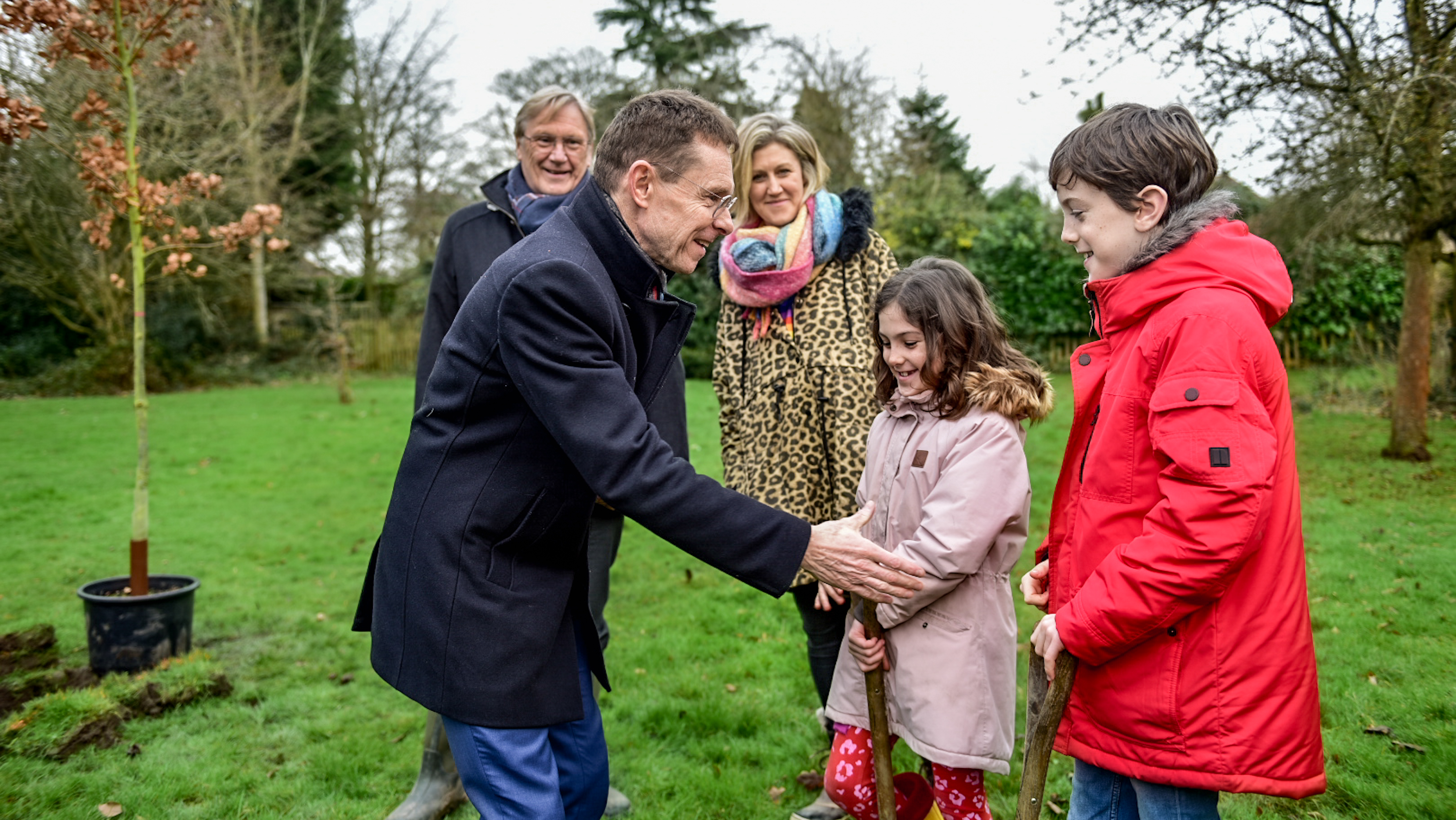 Pictured planting trees at Malvern Park, Solihull, are (L-R) Cllr Ian Courts, leader of Solihull Council and WMCA portfolio holder for the environment, Mayor of the West Midlands Andy Street, Carly Uttridge of Wonder Woods Forest School and her children Mabel and George