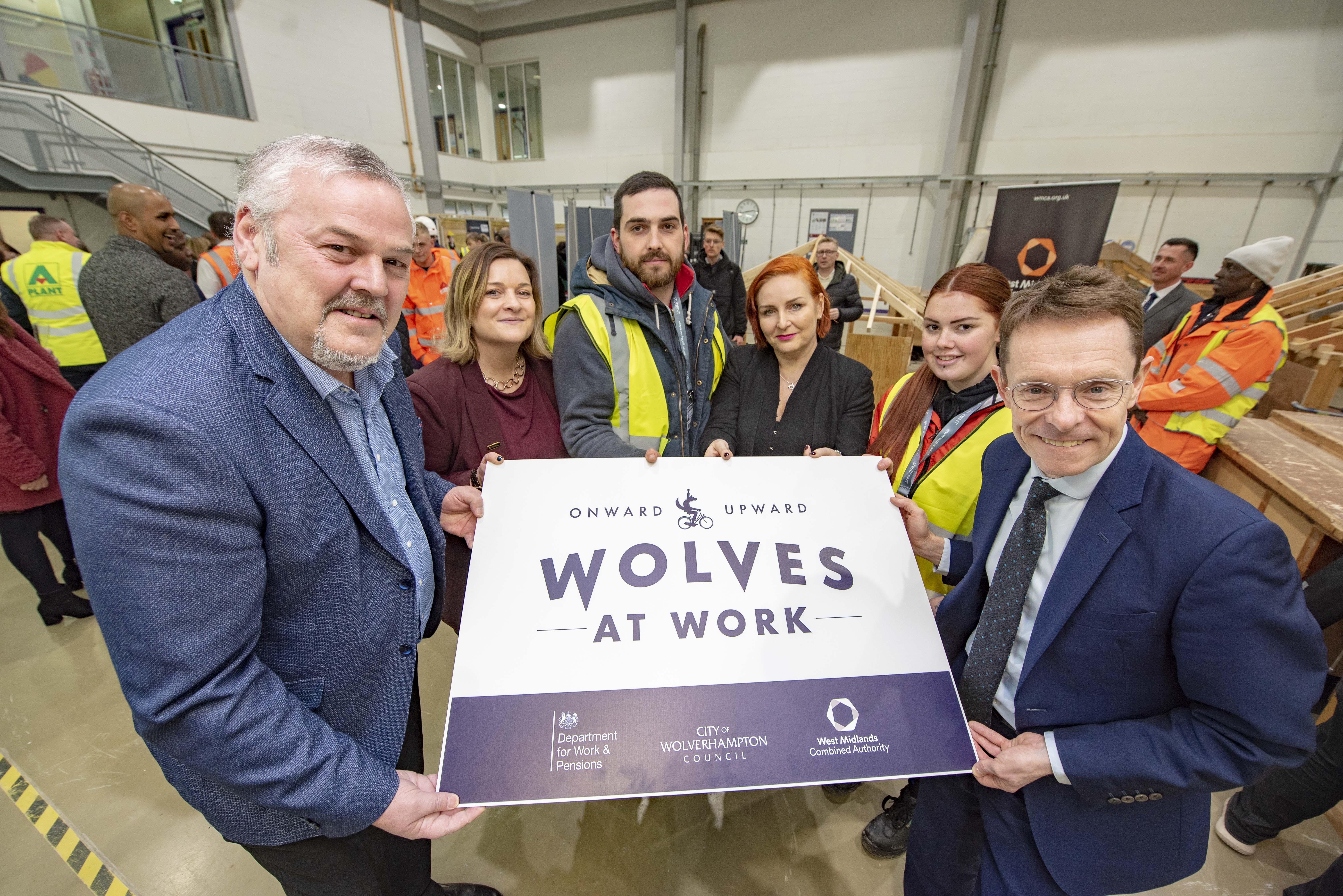 L-R City of Wolverhampton Council Leader, Cllr Ian Brookfield, WMCA Head of Skills Delivery, Clare Hatton, WMCA Director of Productivity and Skills, Julie Nugent, and Mayor of the West Midlands, Andy Street, plus, in hi-vis vests, Construction Gateway participants Adam Cain, 30, and Victoria Hinton, 22, who are being supported by Wolves at Work at City of Wolverhampton College