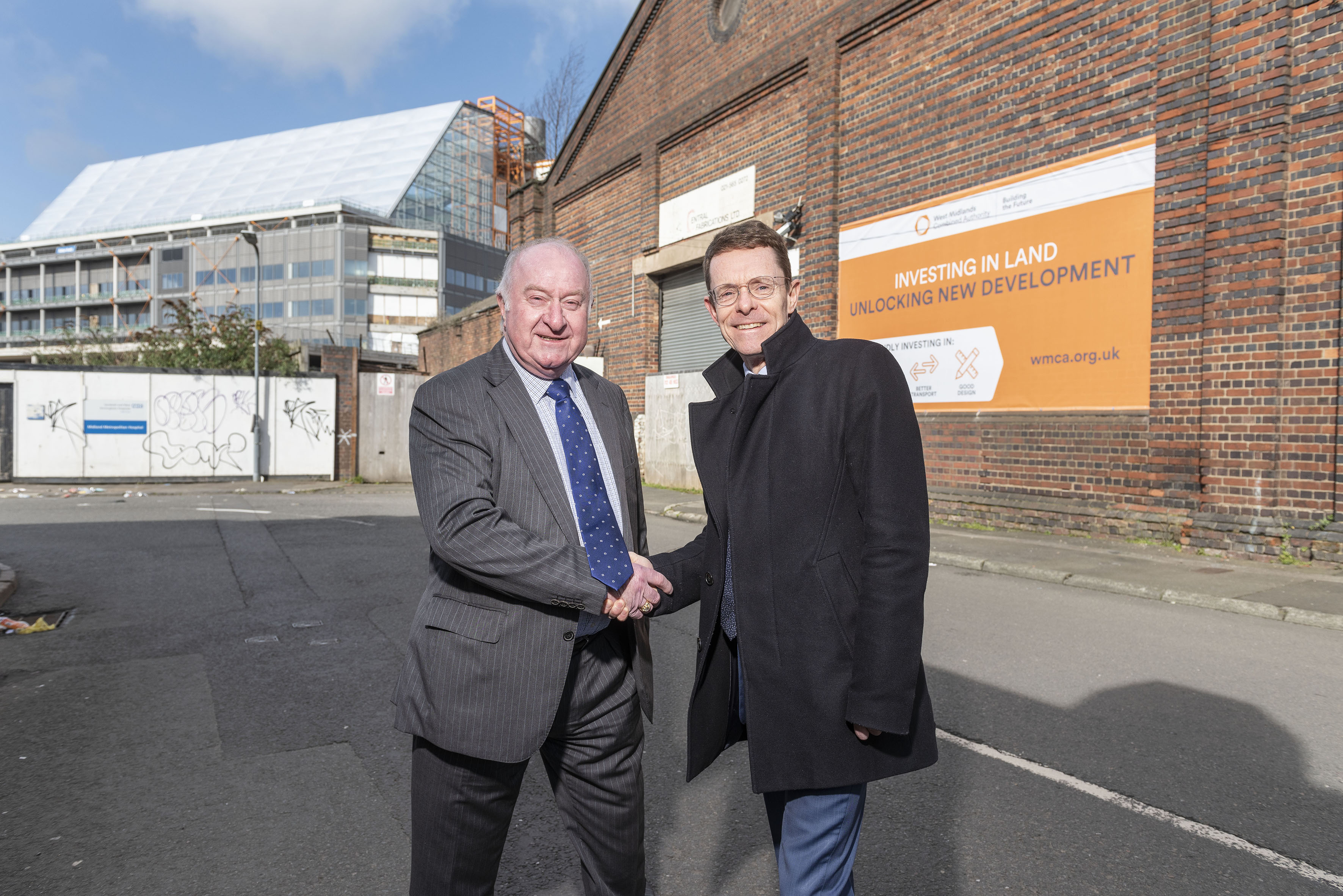Sealing the deal: Cllr Mike Bird (left) WMCA portfolio holder for housing and land and leader of Walsall Council and Mayor of the West Midlands Andy Street outside the derelict industrial units next to the Midland Metropolitan Hospital