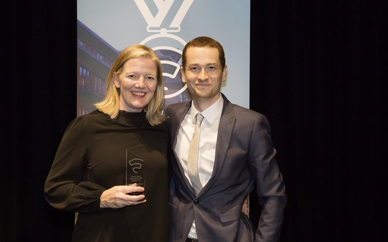 L-R Former bootcamper Clare Streets is pictured holding her Graduate Developer of the Year award from the West Midlands Tech Awards, with Chris Meah, founder of the School of Code