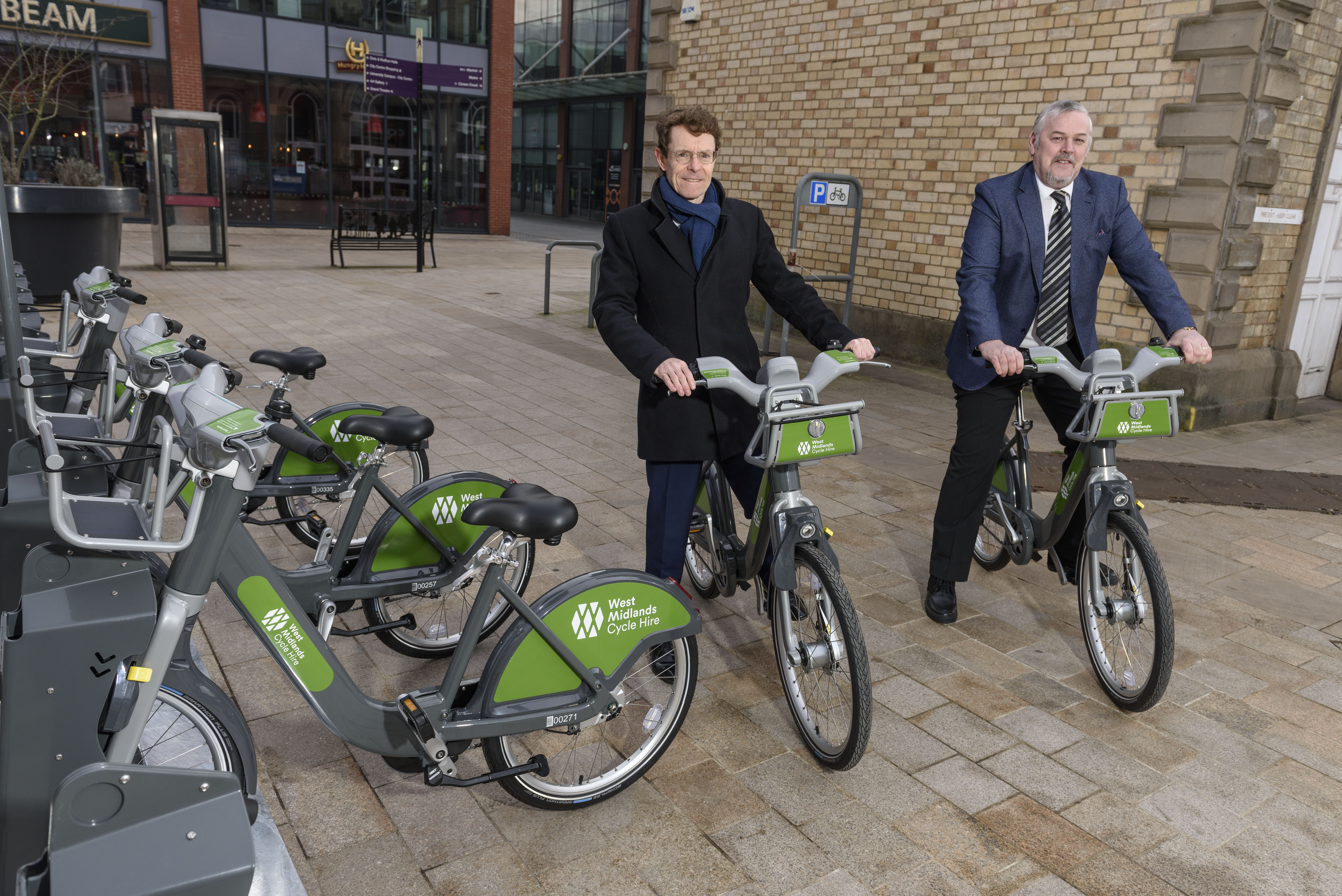 Mayor Andy Street and Cllr Ian Brookfield check out the new bikes