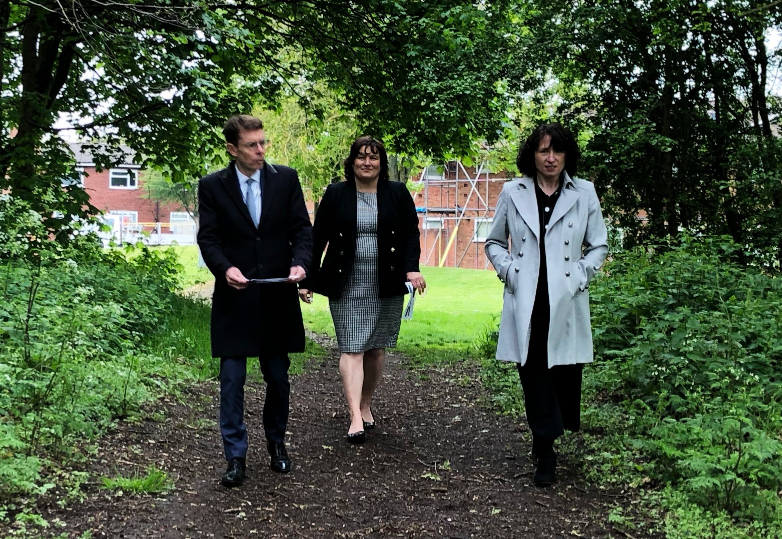 Andy Street, Mayor of the West Midlands, Debbie Willetts, Howells company secretary and Tracey Jackson business development manager on a nearby nature trail