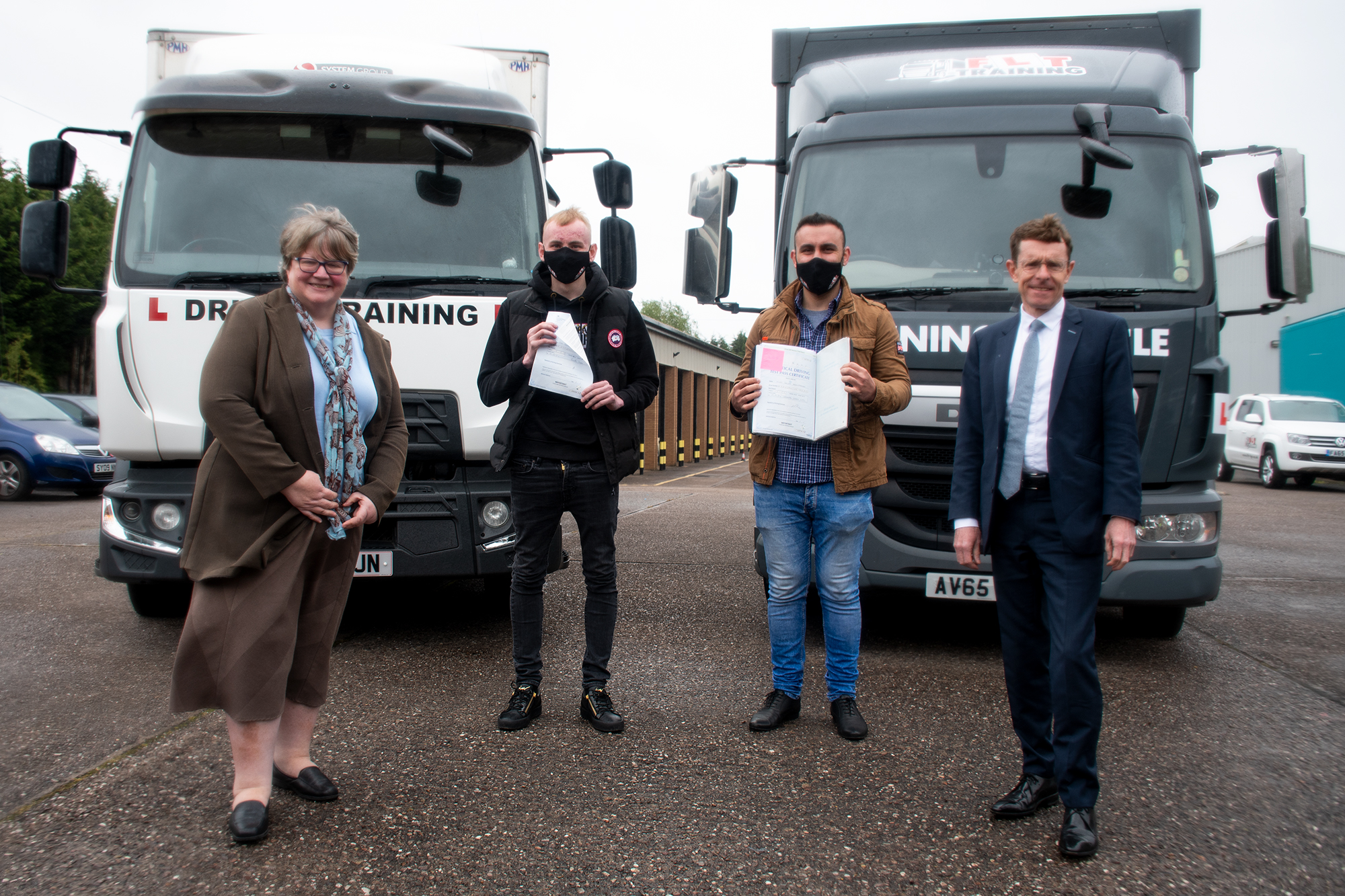 L-R  Thérèse Coffey, Work and Pensions Secretary of State, learners Milad Hasan Abdulrahman and Zach Mason, and Andy Street, Mayor of the West Midlands