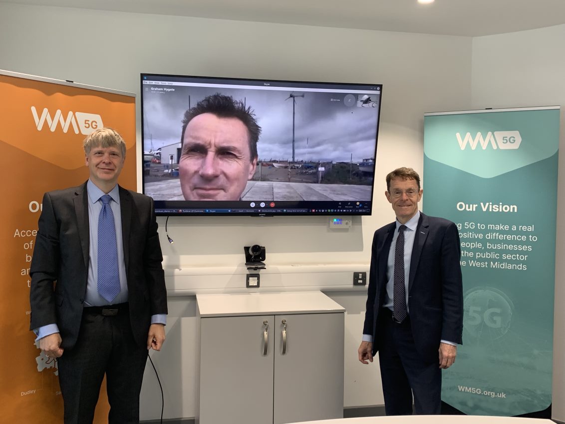 (l-r) Ulf Aberg, Osmium technology lead; Andy Street, the Mayor of the West Midlands. On screen Graham Hygate, a director of Fine Energy
