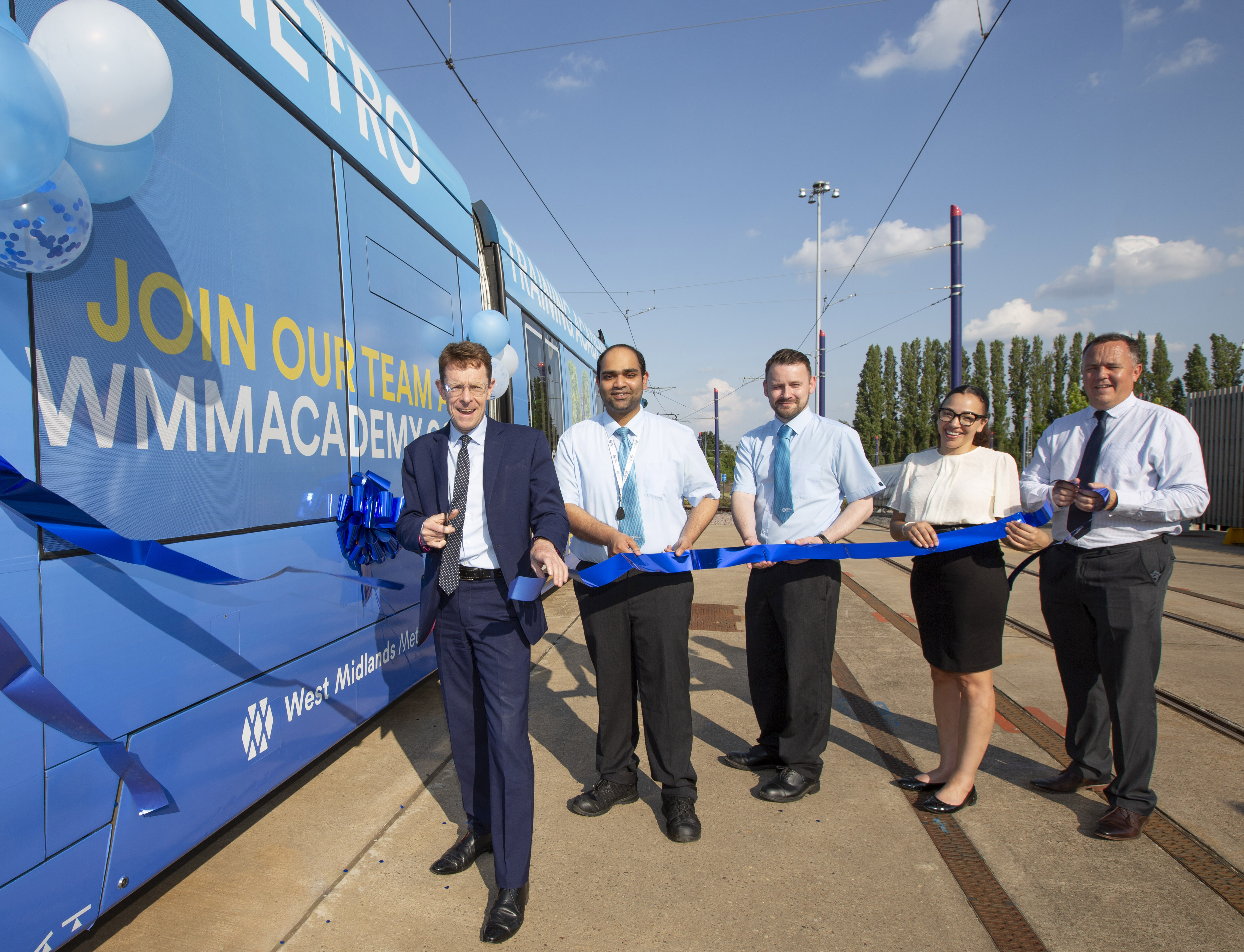 Mayor of the West Midlands Andy Street at the opening of the new Academy with members of the West Midlands Metro Team (left to right), recently qualified drivers Amal Prasad and Phillip Corbett-Butler, commercial director Sophie Allison and Anthony Stanley, head of quality, health and safety and environment.