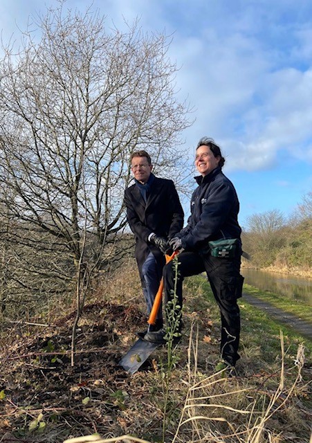 Andy Street, Mayor of the West Midlands is pictured planting a tree with Tara Sexton, volunteer team leader for Canal & River Trust Birmingham